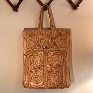 Hand tooled leather purse.